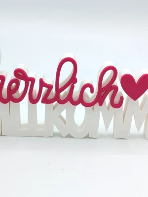 Schriftzug „herzlich Willkommen" – zweifarbiger Tischaufsteller